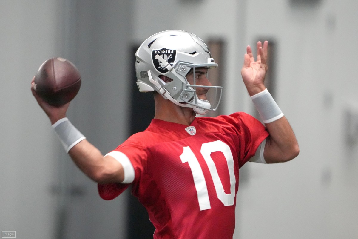 Raiders quarterback Jimmy Garoppolo works during training camp.